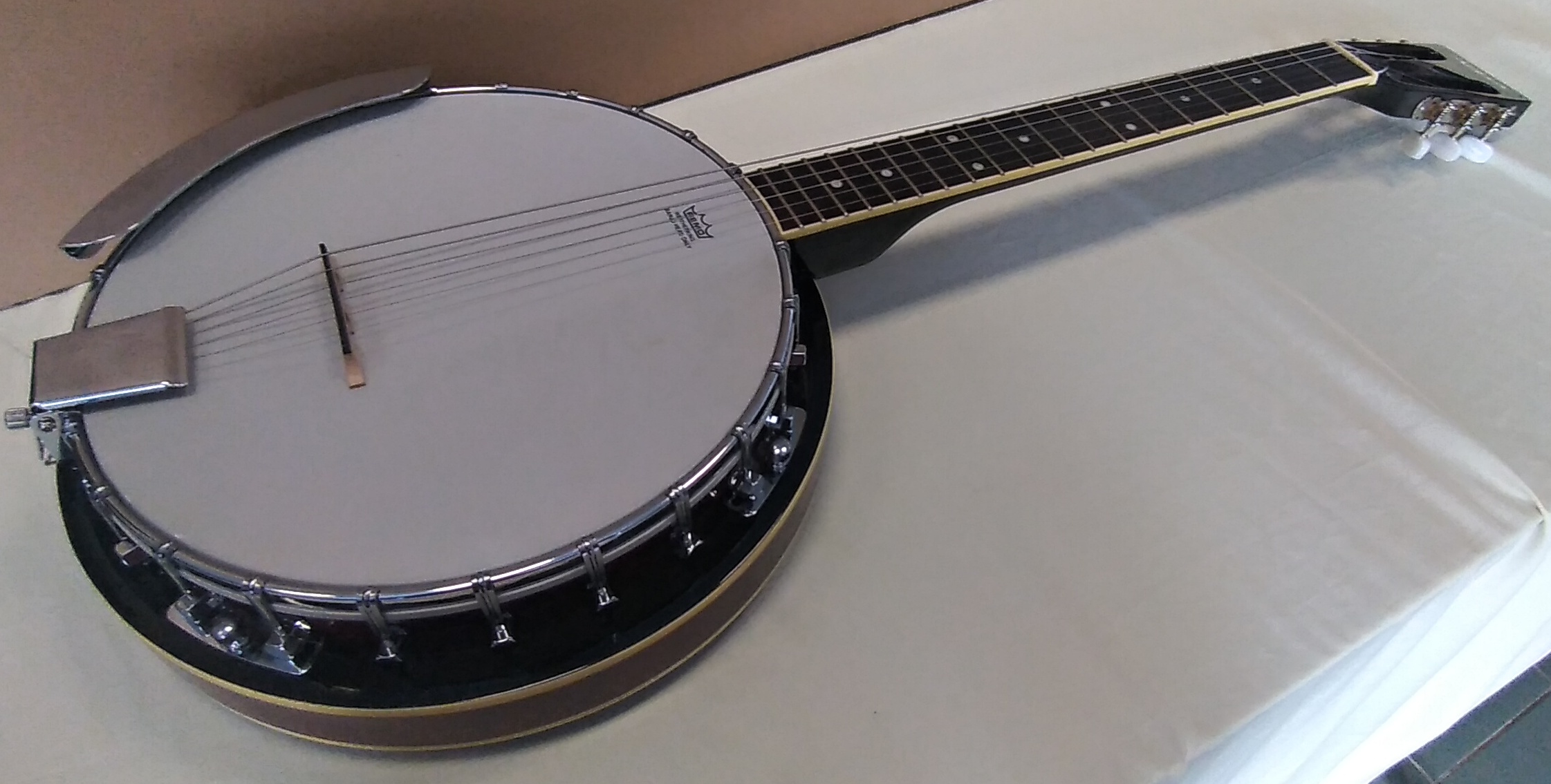 Aria - banjo bez označení