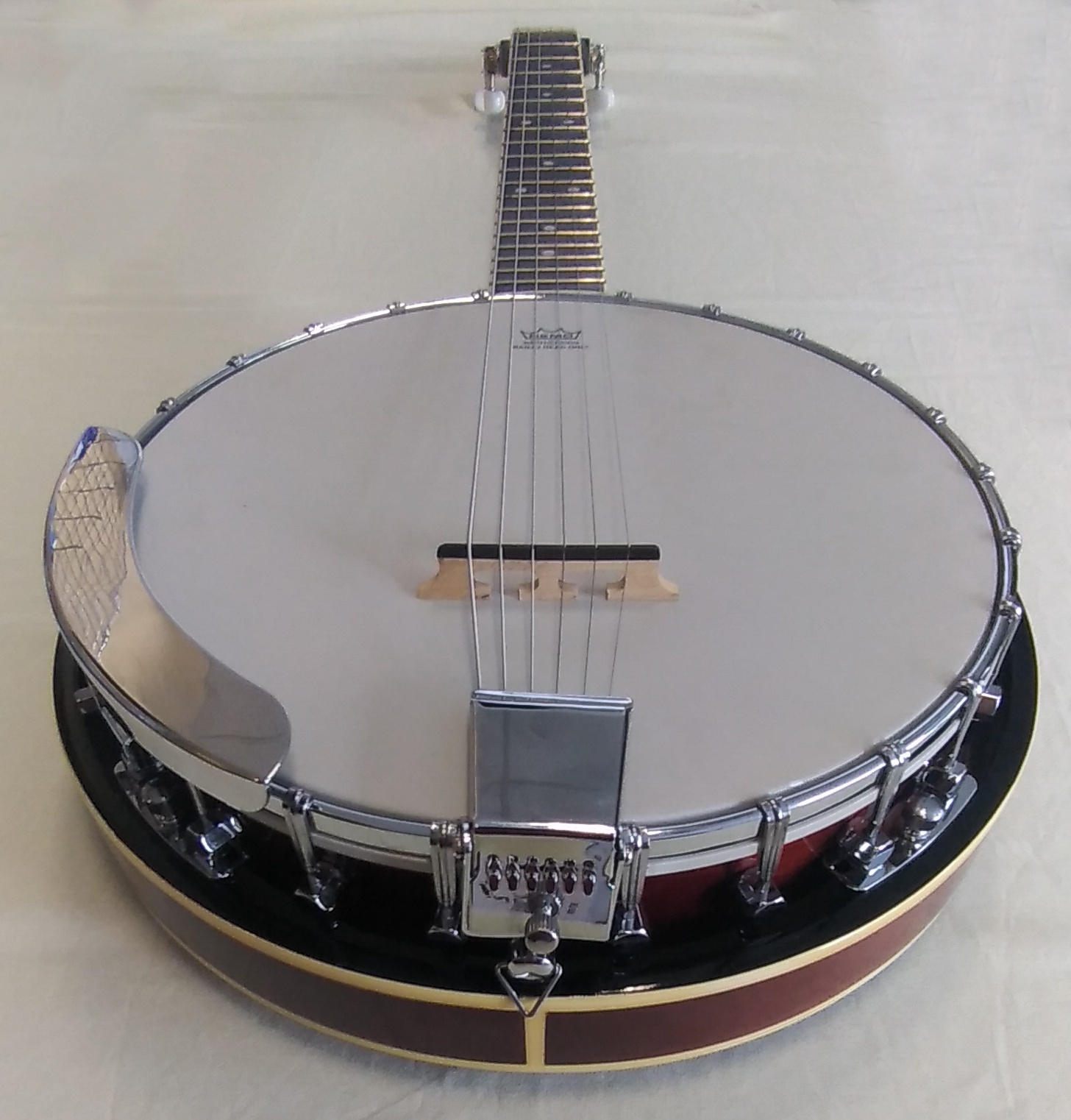Aria - banjo bez označení